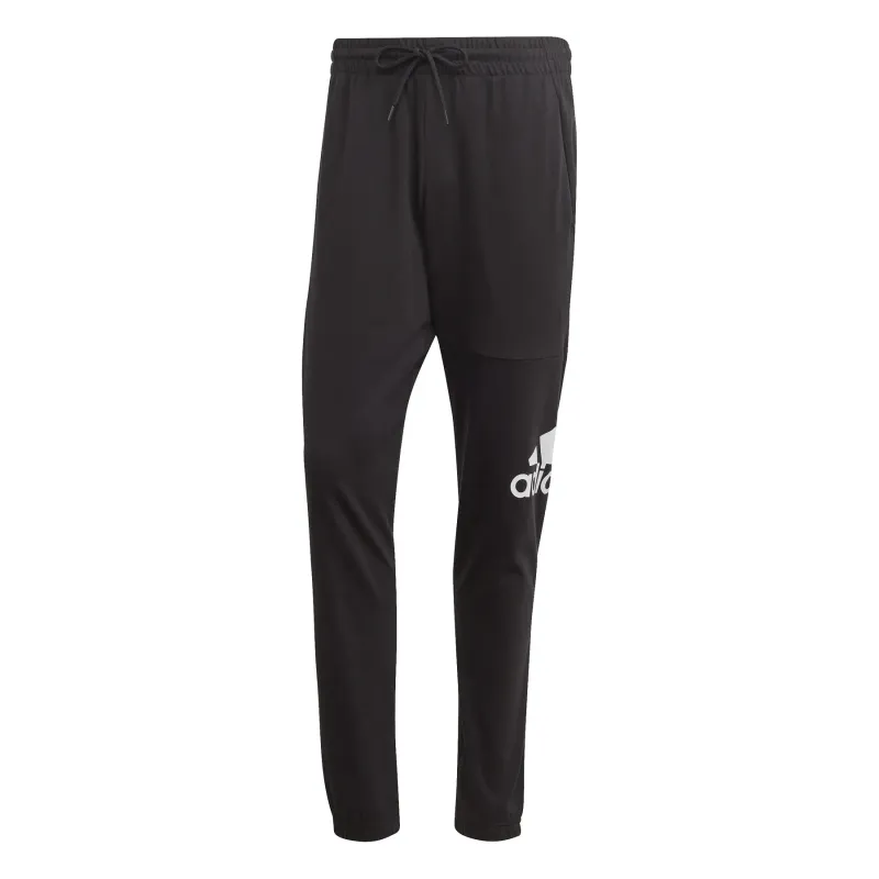 Pantaloni da jogging aderenti in jersey adidas Essentials Badge of Sport
